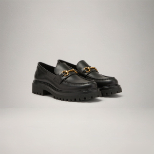 black chunky lug-sole leather loafers with gold horsebit