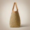 natural hand-woven raffia tote bag with tan leather handles