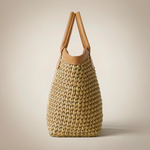 natural hand-woven raffia tote bag with tan leather handles